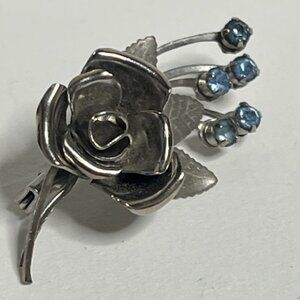 VTG Rose w/Leaves Silver Tone Metal Blue Rhinestone Brooch Pin Floral 1.5"x.75"